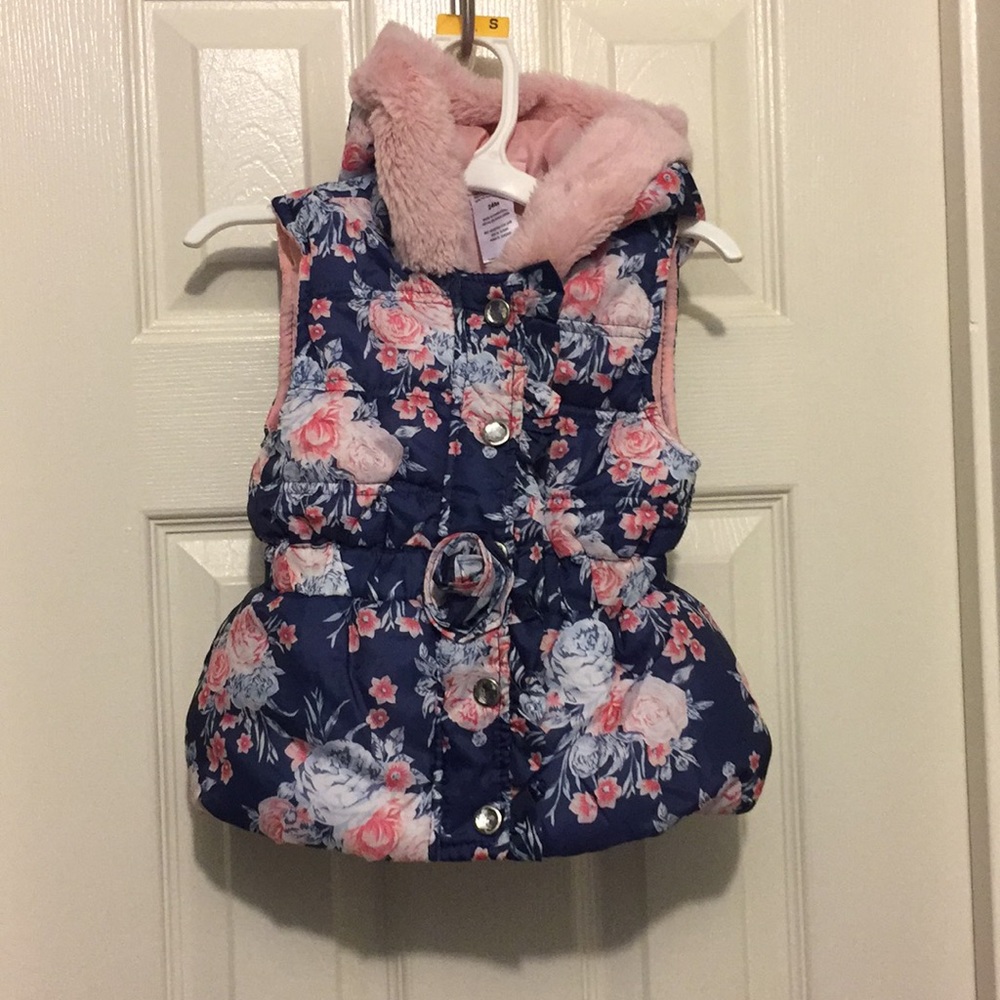 Little girl 5 button and zipper vest.